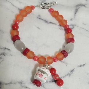 Asian inspired "beckoning cat" charm bracelet